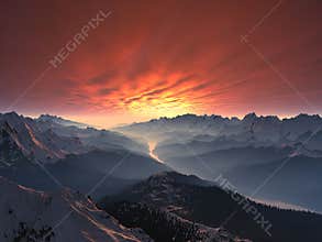 Snow-covered Mountain Valley Sunset