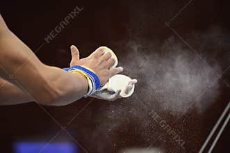 Mens Artistic Gymnastics hands Close up Grips and Chalk