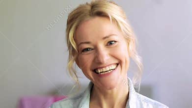 Happy laughing woman face