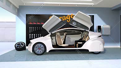 White electric vehicle charging in residential garage