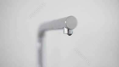 Faucet with water drops.