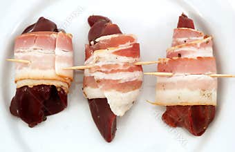 Raw bacon wrapped in Liver