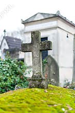 Stone cross on a tomb