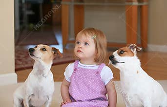 Little Girl With Her Dogs