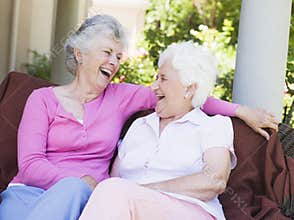Senior female friends laughing together