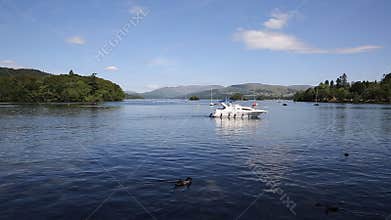 Motor boat Windermere Lake District from Bowness in summer