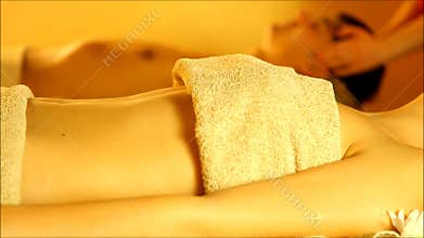 Massage for couple in the warm atmosphere of the salon