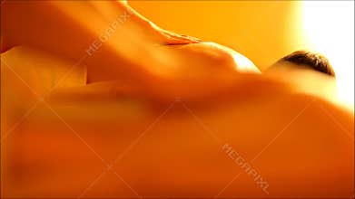 Massage for couple in the warm atmosphere of the salon