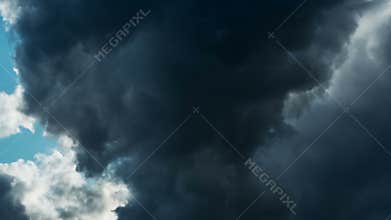 The Movement of the Dark Rain Clouds