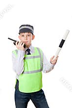 Boy plays in traffic police