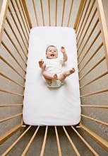 Baby girl in a crib