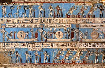 Hieroglyphic carvings in ancient egyptian temple