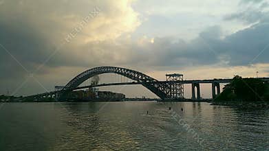 Timelapse with a large container ship passing under Bayonne bridge, NJ