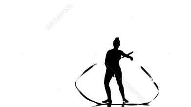 Silhouettes Gymnastic stunt with ribbon from the