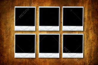 Six Empty polaroids on grunge background