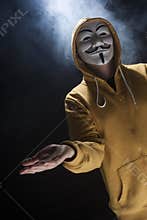 Anonymous activist hacker with mask studio shot