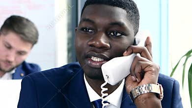 Young businessman wears glasses and is a