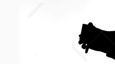 Hands of wizard showing his card trick, silhouette