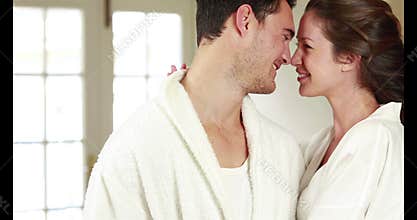 Attractive couple hugging with affection