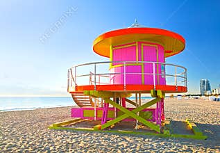 Sunrise in Miami Beach Florida, with a colorful pink lifeguard house