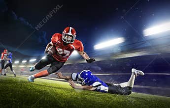 American football players in action on grand arena