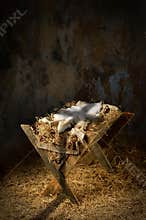 Empty Manger With Cross Shadow