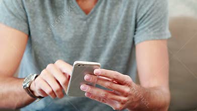 Happy young man having a phone call