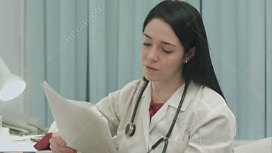 Doctor analyzing results an electrocardiogram