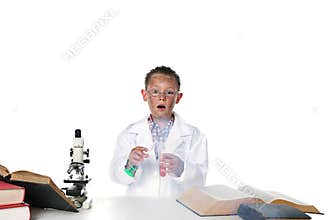 Child scientist blowing up tubes