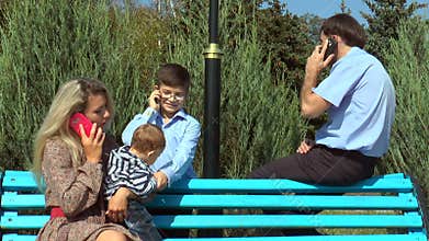 Family members talk on the phone