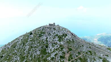 Look at Makarska from the top of the mountains in the clouds