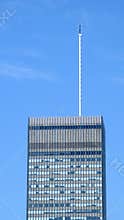 Tall antenna on skyscraper