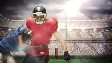 Serious american football player tackling for ball