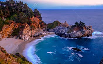 Beach water fall at dusk