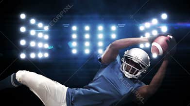 American football player against flashing lights