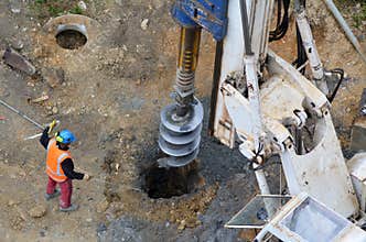 Hydraulic hammer drilling machine at construction site