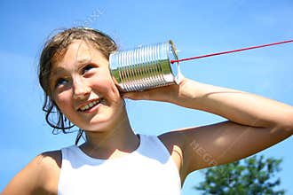 Girl with tin can phone