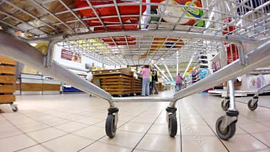 HD 4K (3840X2160) UHDTV: An accelerated footage of a supermarket trolley rolling around the supermarket