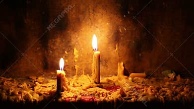 Beautiful dramatic candle lights and melting wax