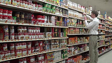 Employee re-stocking shelves