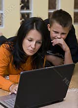 Mother and boy with laptop