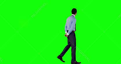 Rear view of businessman with hands behind his back