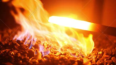 Hot Liquid Metal in a Blacksmith Forge