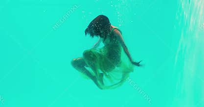 woman diving into the swimming pool