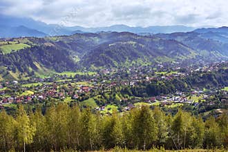 Romanian Village In The Carpathian Mountains