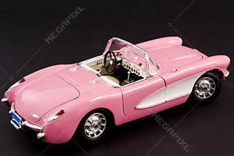 Pink stylish classic sports car