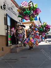 Street vendor of toys and balloons