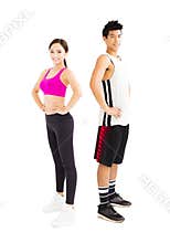 Fitness couple standing together isolated on white