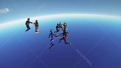 Professional skydivers parachuting above coast of Dubai. Formation. Dance. Sunny