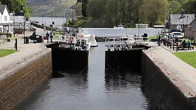 Lock gates closing Caledonian Canal Fort Augustus Scotland UK which connects Fort William to Inverness Loch ness